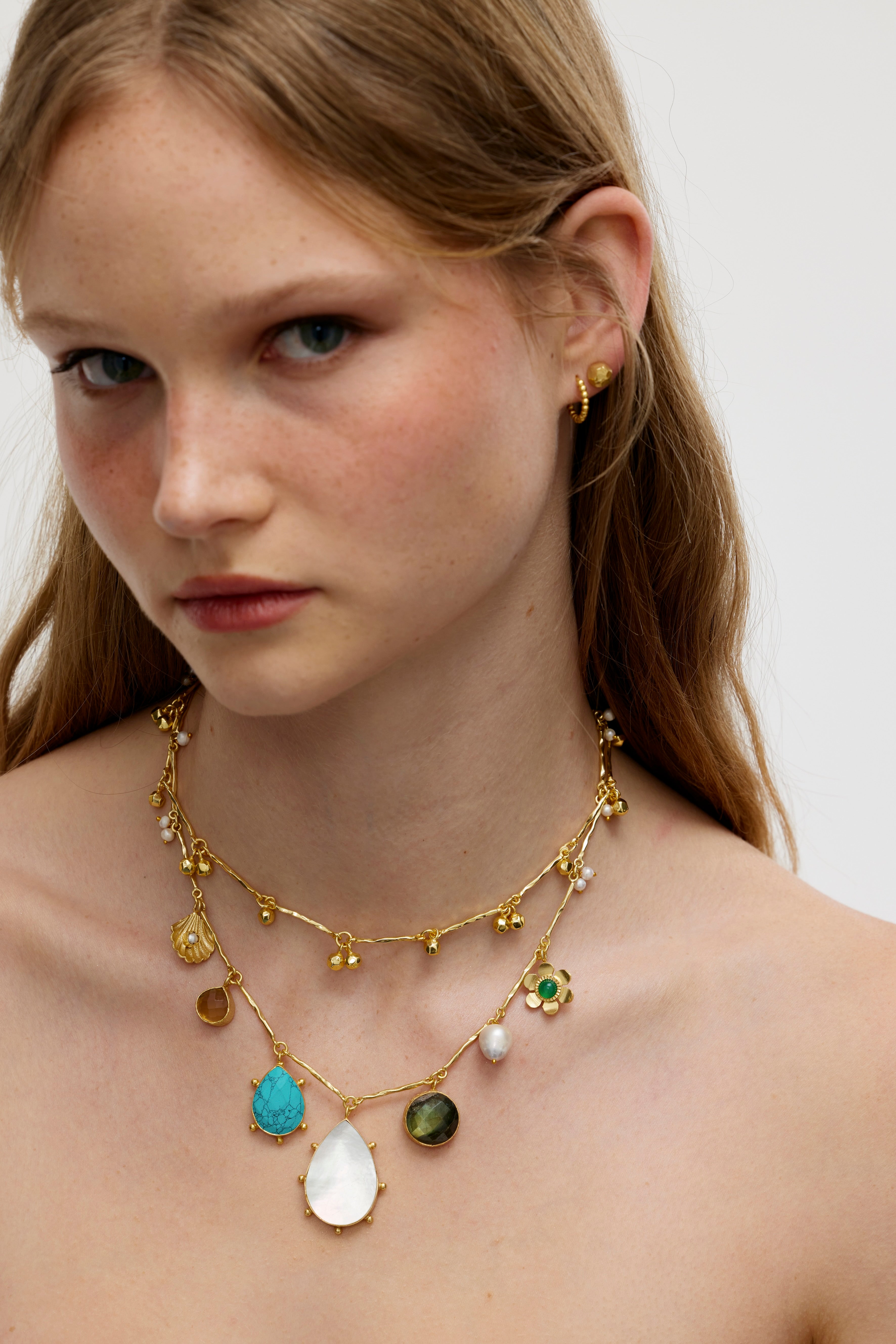 Handcrafted gold charm necklace with semi precious gem stones and gold ball choker necklace designed in Australia by Lanamara