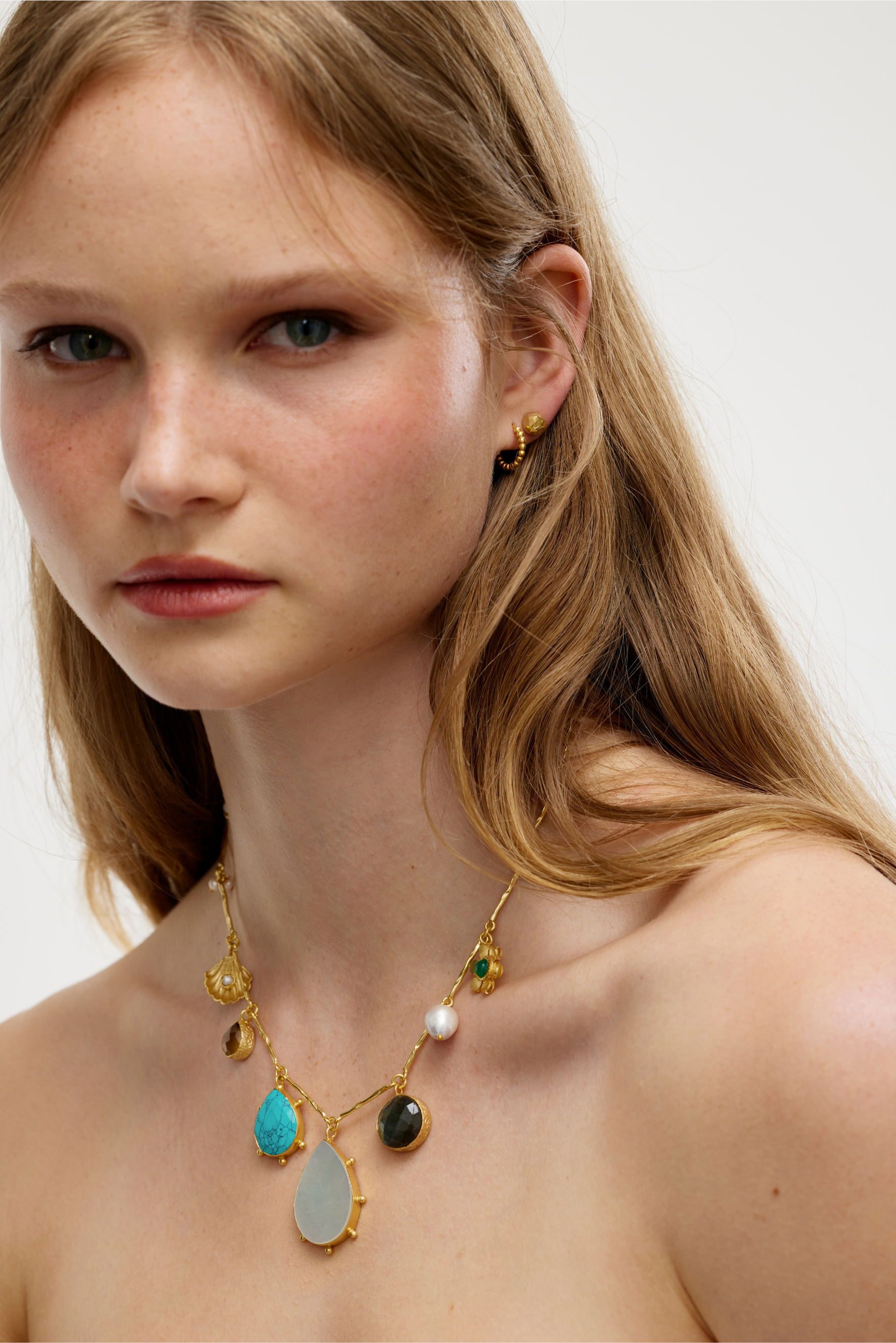 Handcrafted gold charm necklace with semi precious gem stones designed in Australia by Lanamara