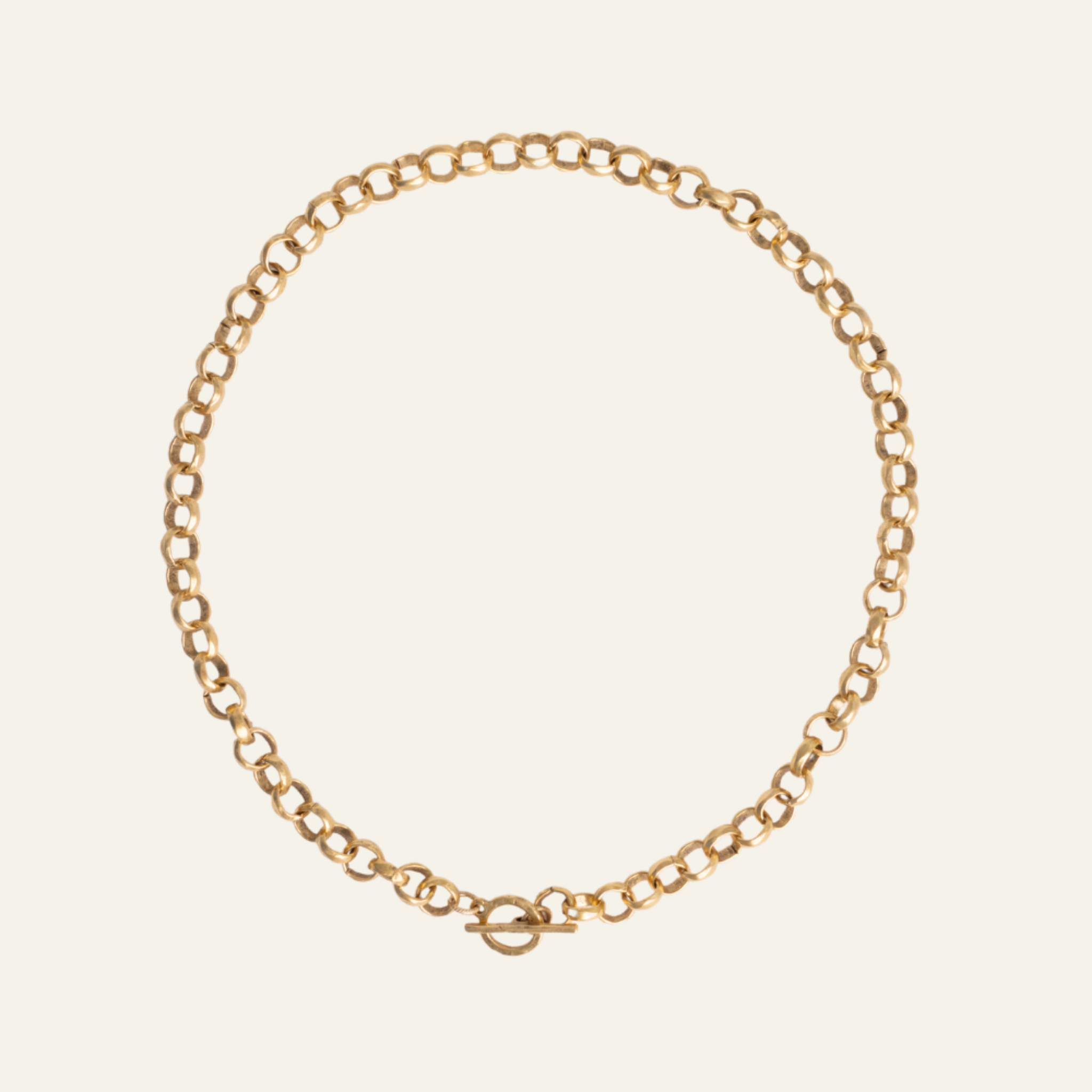 Lanamara Artisan Necklace — hammered gold rolo chain with front toggle clasp