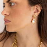 Lanamara Celestial Crystal gold star and Swarovski teardrop earring, worn