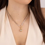 Model wearing Lanamara Clarity Tennis Necklace with bezel-set oval CZ pendant