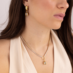 Model wearing Lanamara Clarity Tennis Necklace with bezel-set oval CZ pendant