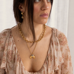 Lanamara Intuition crescent moon necklace worn layered with the Artisan gold chain