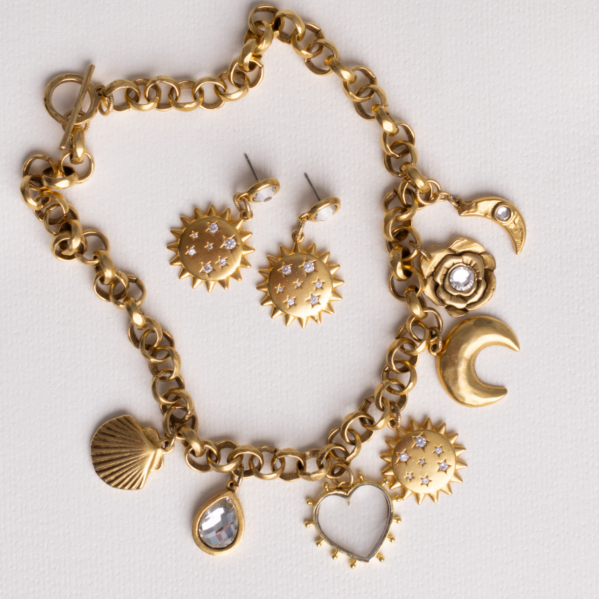 Lanamara Intuition Sunstar earrings styled with the Celestial charm necklace