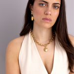 Lanamara Intuition Sunstar necklace worn with matching sun drop earrings, portrait