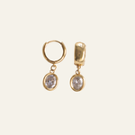 Lanamara Vintage Clarity Huggies – Oval — gold huggie hoops with bezel-set oval CZ drop